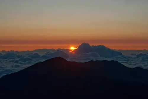 Sunset view from Maui's mountains above the clouds