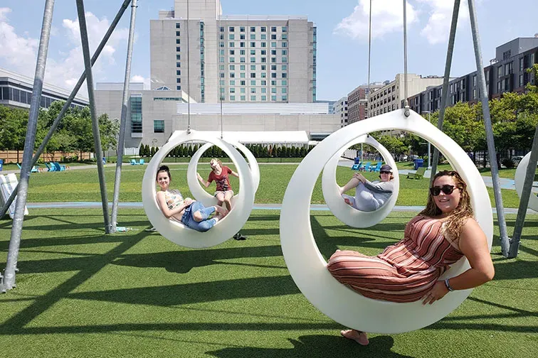 Girls on Swings in Boston; Courtesy of Jeff Bogle