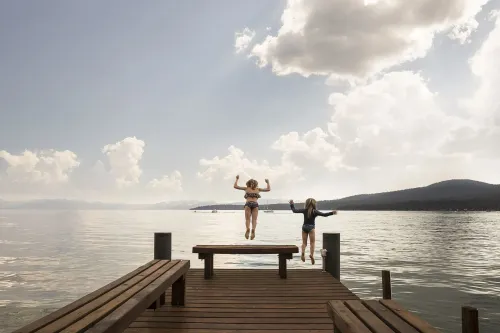 Kids Jumping Off Dock into Water in North Lake Tahoe