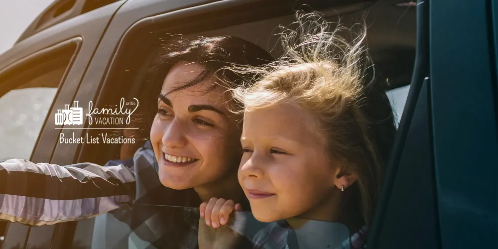 Happy family on a road trip in their car.; Courtesy of Estrada Anton/Shuttertsock