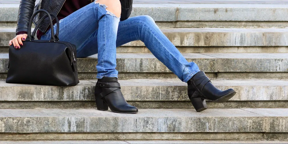mom wearing booties autumn steps; Courtesy of atdigit /Shutterstock