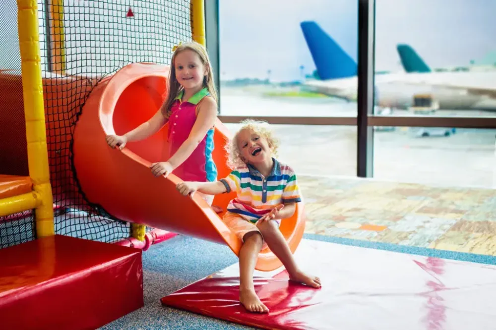 Kids playing in airport playground