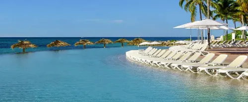 Poolside, ocean view lounge chair at the Grand Lucayan hotel