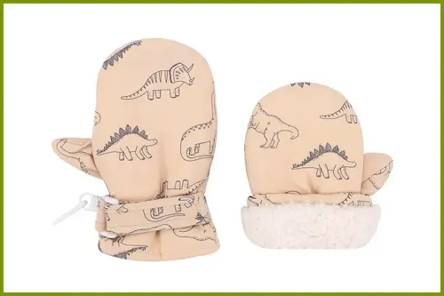 Slivery Color Toddler Gloves in peach with a pattern of dinosaurs