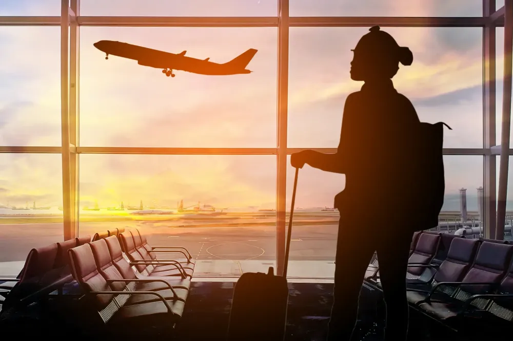 Silhouette of passenger in airport